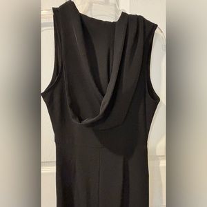 Long gown with hood. Draped front.